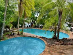 Viehättävä allasalue Mowana Lodgessa Viehättävä allasalue Mowana Lodgessa